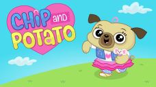 A cute pug, wearing a pink skirt and a blue vest, is holding a tiny mouse in her hands and walking on grass with a blue sky behind her.