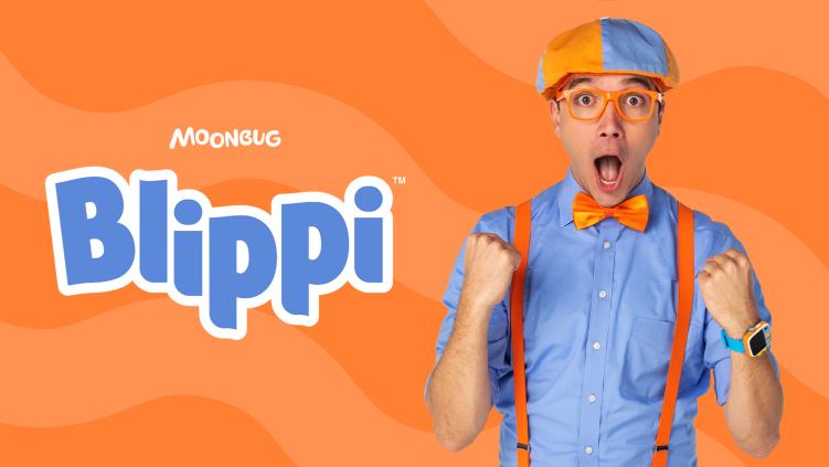 a man is standing suprpirsed in glasses and an orange and blue hat on a bright orange background