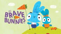 Two blue bunnies standing on a green hill next to a sign that says, Brave Bunnies.